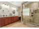 Elegant bathroom with double vanity, granite countertops, and large shower at 11122 N 165Th Ave, Surprise, AZ 85388