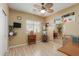 Spacious bedroom with ceiling fan and large mirror at 11122 N 165Th Ave, Surprise, AZ 85388