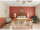 Calm bedroom with wood bed frame and accent wall at 11122 N 165Th Ave, Surprise, AZ 85388