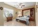 Bedroom with built-in murphy bed and wood shelving at 11122 N 165Th Ave, Surprise, AZ 85388