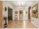 Bright and spacious entryway with tile flooring and decorative accents at 11122 N 165Th Ave, Surprise, AZ 85388