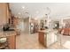 Open kitchen with granite countertops and island at 11122 N 165Th Ave, Surprise, AZ 85388