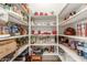 Well-stocked pantry with ample shelving at 11122 N 165Th Ave, Surprise, AZ 85388