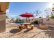 Inviting pool area with patio furniture and fire pit at 11122 N 165Th Ave, Surprise, AZ 85388