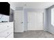 Bedroom with double door closet and view of upper hallway at 11506 E Sylvan Ave, Mesa, AZ 85212