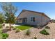 Home exterior and nicely landscaped backyard at 1176 E Ridgerock St, Casa Grande, AZ 85122