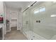 Spa-like bathroom with walk-in shower and built-in bench at 1176 E Ridgerock St, Casa Grande, AZ 85122