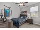 Charming bedroom with ceiling fan and guitar decor at 1176 E Ridgerock St, Casa Grande, AZ 85122