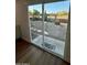 View of backyard through sliding glass door at 11808 S Half Moon Dr, Phoenix, AZ 85044