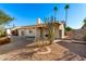 View of home's back and side yards with gravel landscaping at 11808 S Half Moon Dr, Phoenix, AZ 85044