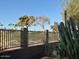 Backyard view with a fence and golf course view at 11808 S Half Moon Dr, Phoenix, AZ 85044