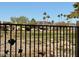 Backyard view with a fence and neighboring homes at 11808 S Half Moon Dr, Phoenix, AZ 85044