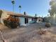 Spacious backyard with gravel landscaping and desert plants at 11808 S Half Moon Dr, Phoenix, AZ 85044