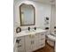 Bathroom with white vanity and a large mirror at 11808 S Half Moon Dr, Phoenix, AZ 85044