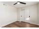 Bright bedroom with ceiling fan and sliding door closet at 11808 S Half Moon Dr, Phoenix, AZ 85044