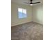 Bedroom with neutral carpet and window at 11808 S Half Moon Dr, Phoenix, AZ 85044