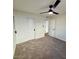 Bright bedroom with carpet flooring and double door closet at 11808 S Half Moon Dr, Phoenix, AZ 85044