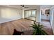 Main bedroom with wood-look flooring and mirrored closet at 11808 S Half Moon Dr, Phoenix, AZ 85044