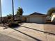 Front view of a single-story home at 11808 S Half Moon Dr, Phoenix, AZ 85044