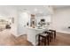 Modern kitchen with white cabinetry, center island, and stainless steel appliances at 11808 S Half Moon Dr, Phoenix, AZ 85044