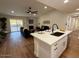 Open concept kitchen with island and stainless steel appliances at 11808 S Half Moon Dr, Phoenix, AZ 85044