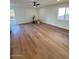 Spacious living room with wood-look flooring at 11808 S Half Moon Dr, Phoenix, AZ 85044