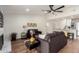 Bright living room with hardwood floors and a cozy fireplace at 11808 S Half Moon Dr, Phoenix, AZ 85044