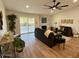 Living room with sliding glass doors and a fireplace at 11808 S Half Moon Dr, Phoenix, AZ 85044