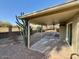 Covered patio with ceiling fan, adjacent to backyard at 11808 S Half Moon Dr, Phoenix, AZ 85044