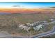 Expansive aerial view of a luxury community with mountain views at sunset at 14245 N Territory Trl, Fountain Hills, AZ 85268