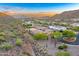 Aerial view of community, showcasing a luxury home and landscape at 14245 N Territory Trl, Fountain Hills, AZ 85268