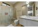 Modern bathroom with glass shower, floating vanity, and view at 14245 N Territory Trl, Fountain Hills, AZ 85268