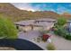 Luxury home exterior with mountain views and landscaping at 14245 N Territory Trl, Fountain Hills, AZ 85268