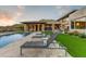 Relaxing pool area with lounge chairs and mountain views at 14245 N Territory Trl, Fountain Hills, AZ 85268