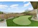 Landscaped backyard with private putting green at 14245 N Territory Trl, Fountain Hills, AZ 85268