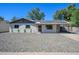 Newly renovated home with solar panels and a gravel front yard at 14626 N 36Th Pl, Phoenix, AZ 85032