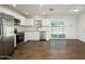 Modern kitchen with stainless steel appliances and tile floor at 14626 N 36Th Pl, Phoenix, AZ 85032