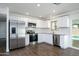 Modern kitchen featuring stainless steel appliances and granite countertops at 14626 N 36Th Pl, Phoenix, AZ 85032