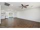 Open concept living room with kitchen and pool views at 14626 N 36Th Pl, Phoenix, AZ 85032