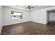 Bright living room featuring tile floors and a large window at 14626 N 36Th Pl, Phoenix, AZ 85032