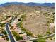 Aerial view showcasing the neighborhood's landscape and surrounding mountain views at 15237 S 19Th Way, Phoenix, AZ 85048