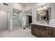 Bathroom features a large walk-in shower and modern vanity at 15237 S 19Th Way, Phoenix, AZ 85048