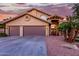 Two-story house with double garage and desert landscaping at 15237 S 19Th Way, Phoenix, AZ 85048