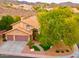 Well-maintained two-story home with a three-car garage, manicured landscaping, and a tiled roof at 15237 S 19Th Way, Phoenix, AZ 85048