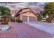 Two-story home with a brick driveway and palm trees at 15237 S 19Th Way, Phoenix, AZ 85048