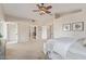 Spacious main bedroom with vaulted ceiling and en-suite bathroom at 15237 S 19Th Way, Phoenix, AZ 85048