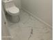 Clean bathroom with toilet and marble flooring at 15869 E Ponderosa Dr, Fountain Hills, AZ 85268