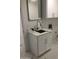 White vanity with black countertop and sink at 15869 E Ponderosa Dr, Fountain Hills, AZ 85268