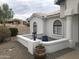 Front entrance with columns, arched entryway, and landscaping at 15869 E Ponderosa Dr, Fountain Hills, AZ 85268