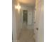 Clean hallway with white doors and marble floors at 15869 E Ponderosa Dr, Fountain Hills, AZ 85268